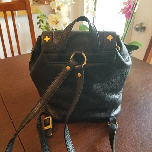 Authentic MCM Studded Black Leather Backpack in excellent used condition. - Picture 4 of 16